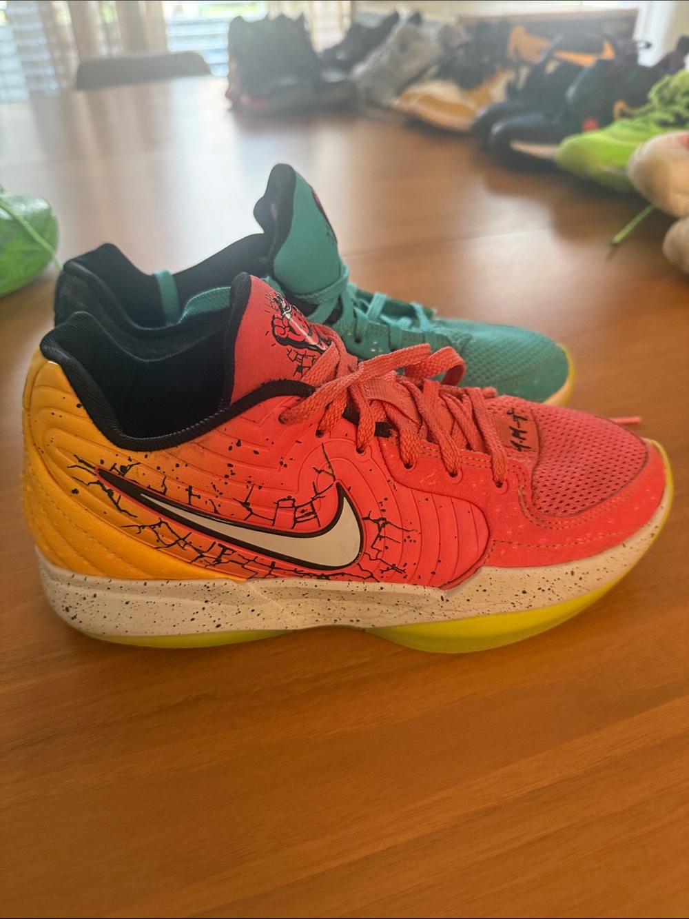 Nike Kids Mismatched Pink & Teal Sneakers with Character Graphic - Picture 2 of 5